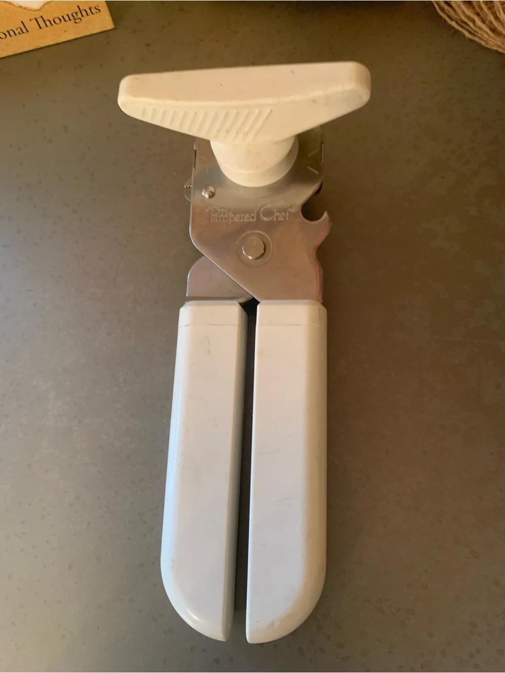 The Pampered Chef safety smooth edge, manual WHITE and SILVER can opener.